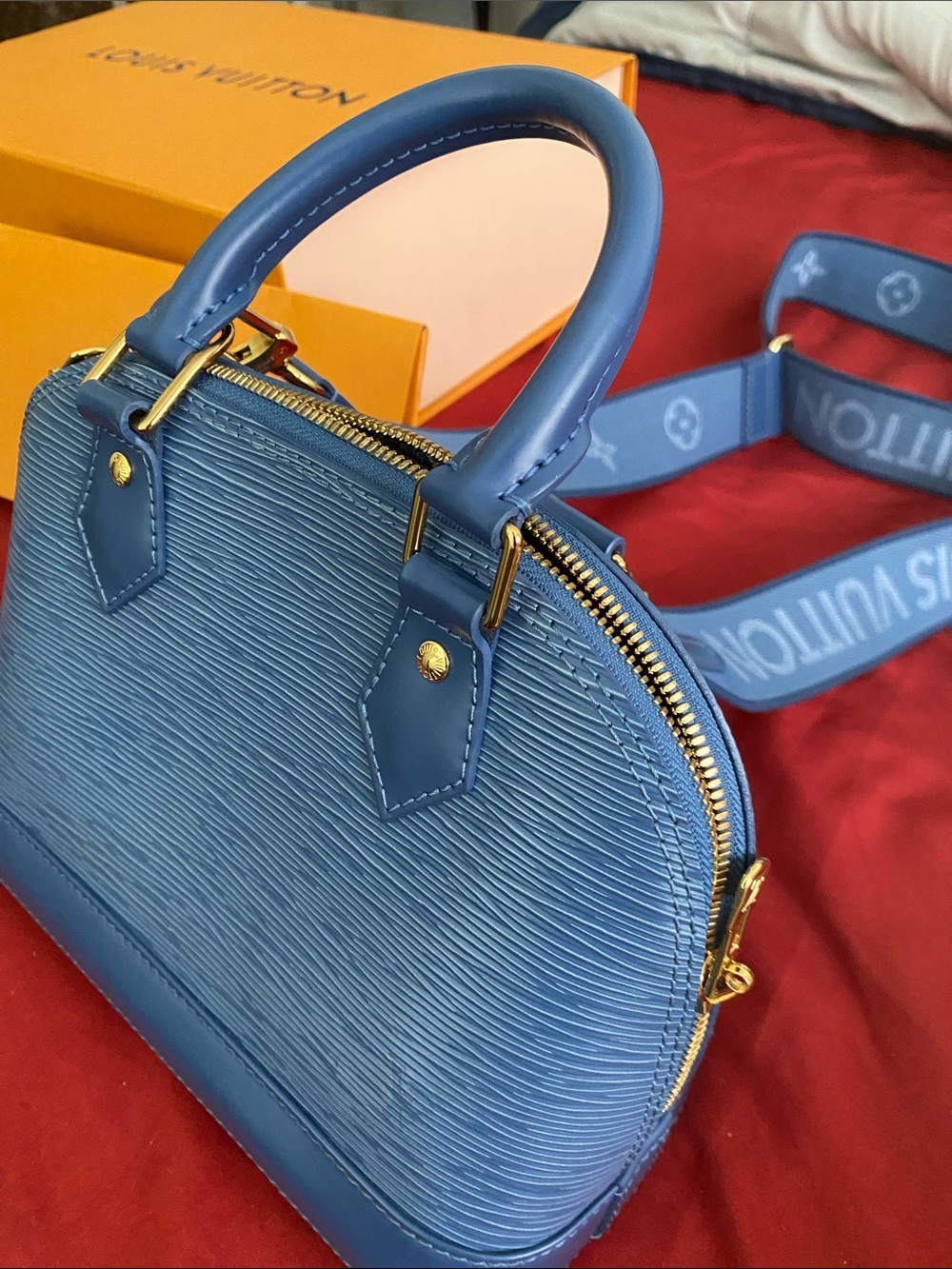 Louis Vuitton Blue Epi Alma BB Satchel with Gold Hardware